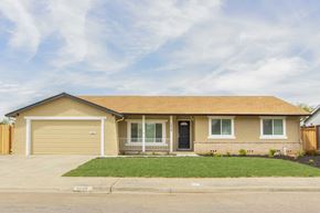 Pittsburg apartment for rent - A house with a brown roof and a garage door.