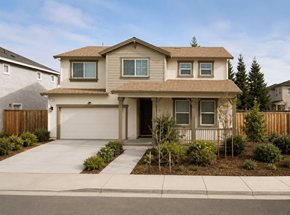 Chico apartment for rent - A beige house with a brown roof and a white garage door.