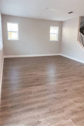 Chico apartment for rent - A room with wooden flooring and a staircase.