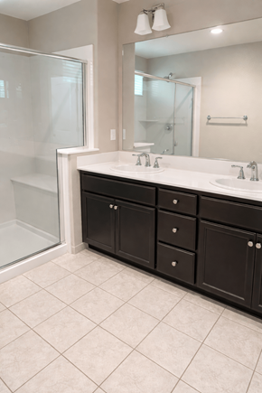 Chico house for rent - A bathroom with a sink, mirror, and cabinet.