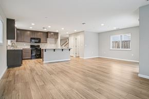 Bay Point apartment for rent - A spacious kitchen with wooden floors and modern appliances.