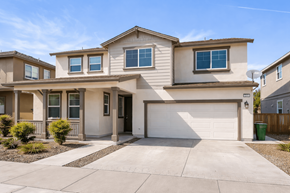 Chico apartment for rent - A two-story house with a garage and a driveway.