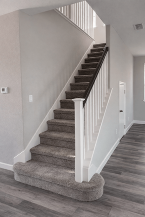 Chico apartment for rent - A staircase with a carpeted stair runner and white risers.