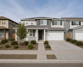 Chico apartment for rent - A modern house with a grey front yard and a white garage door.
