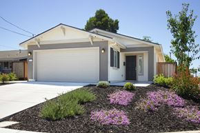Pittsburg apartment for rent - A house with a grey roof and a white garage door.