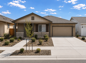 Chico apartment for rent - A house with a brown roof and a white garage door.
