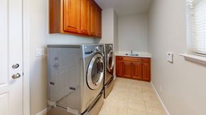 Fairfield apartment for rent - A laundry room with a washer and dryer.