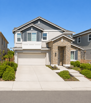 Antioch apartment for rent - A modern house with a grey roof and a stone pillar entrance.