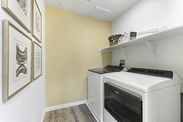 Chico apartment for rent - A white oven is in a kitchen with a shelf above it.