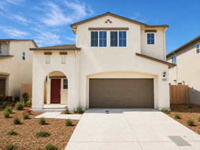 Chico apartment for rent - A two-story house with a red door and a garage.
