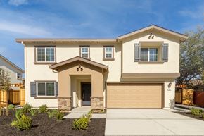Pittsburg house for rent - A two-story house with a garage door and a front door.