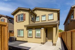 Pittsburg apartment for rent - A two-story house with a brown and beige exterior.