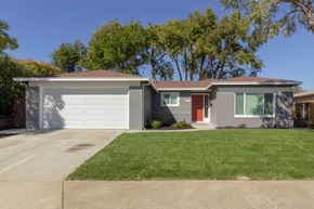 Pittsburg apartment for rent - A house with a garage and a driveway.