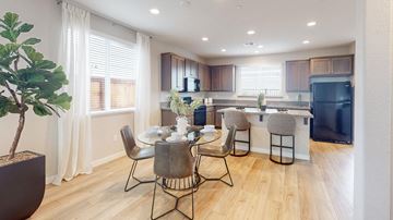 Fairfield apartment for rent - A modern kitchen with a dining table set for four.