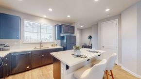 Fairfield apartment for rent - A modern kitchen with a dining table and chairs.