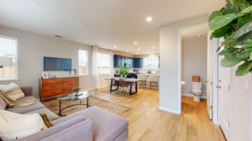 Fairfield apartment for rent - A living room with a grey couch and a wooden coffee table.