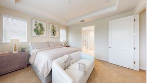 Fairfield apartment for rent - A bedroom with two beds and a white couch.