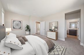 Vacaville house for rent - A Bedroom with a Large Bed at Montessa Apartments, Vacaville, California