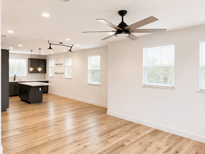 Martinez townhouse for rent - A room with a ceiling fan and wooden flooring.