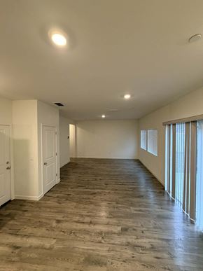 Chico apartment for rent - A room with wooden flooring and white walls.