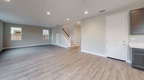 Chico apartment for rent - A spacious room with wooden flooring and white walls.