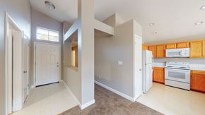 Bay Point apartment for rent - A kitchen with white appliances and wooden cabinets.
