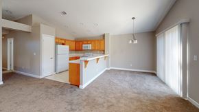 Bay Point apartment for rent - A kitchen area with a white refrigerator and a white countertop.