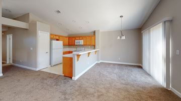 Bay Point apartment for rent - A kitchen area with a white refrigerator and a white cabinet.