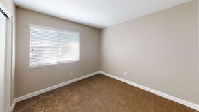 Bay Point apartment for rent - A room with a window and carpeted floor.
