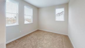 Fairfield apartment for rent - A room with carpeted floor and two windows.