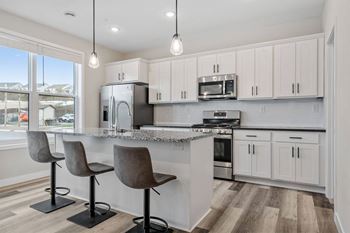White shaker cabinets with matte black hardware