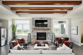 Rochester apartment for rent - A modern living room with a fireplace and a couch.
