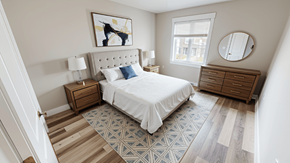 Fredericton apartment for rent - A bedroom with a bed, nightstand, and dresser.
