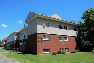 Fredericton apartment for rent - A building with a sign that says "The Inn" on it.