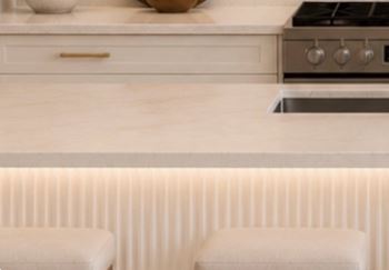Quartz countertops, backsplash and waterfall islands