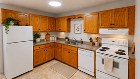 Fredericton apartment for rent - A kitchen with wooden cabinets and white appliances.