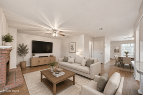 Austin apartment for rent - A living room with a fireplace and a flat screen TV.