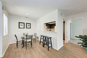 Austin apartment for rent - A dining room with a white table and chairs.