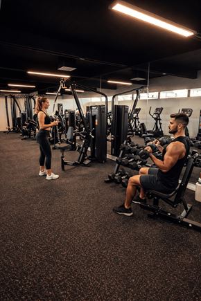 Las Vegas apartment for rent - A man and a woman are working out in a gym.