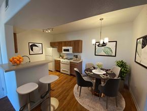 Las Vegas apartment for rent - A kitchen with a dining table and chairs.