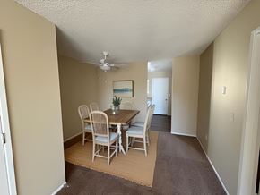Costa Mesa apartment for rent - A dining room with a table and chairs.