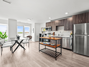 Waterloo apartment for rent - A modern kitchen with a dining table and chairs.
