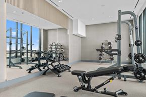 Hamilton apartment for rent - A gym with a variety of equipment including a rowing machine.