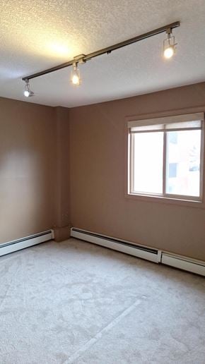 Calgary apartment for rent - A room with a window and a light on the ceiling.