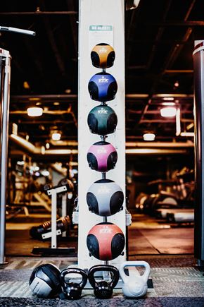 Dayton apartment for rent - Fitness Center at The Cannery Lofts with a variety of medicine balls and weights