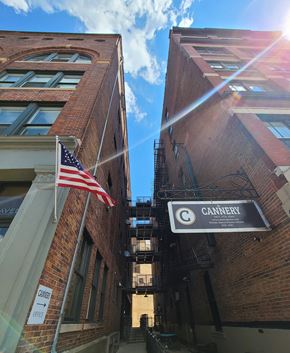 Dayton apartment for rent - A narrow alley with a Cannery sign on the right.