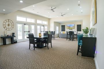 Beavercreek apartment for rent - A living room with a dining table and chairs.