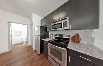 Chef’s kitchens with breakfast bars and pantries