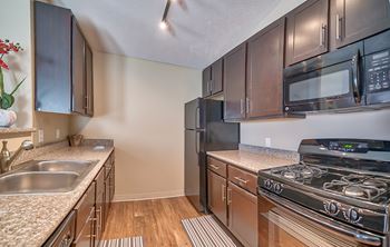 Fully-equipped kitchens include refrigerators with ice maker, self-cleaning gas ranges and dishwashers