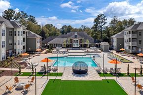 Charlotte apartment for rent - Large courtyard with saltwater pool, firepit, entertaining areas and gas grills